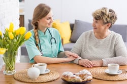 Caregiver-and-a-senior-lady-si